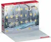 A Harry Potter themed advent calendar with a castle and snowy landscape. Produktbild-Vorschau