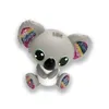 A small, gray, cartoon-like koala figurine with large green eyes and rainbow-colored accents on its ears and feet, sitting on a white background. Produktbild-Vorschau