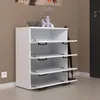 A white shoe cabinet with four flip-down drawers is shown in a hallway setting. Produktbild-Vorschau