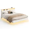 A modern white bed with integrated shelf and ambient lighting. Náhled obrázku produktu