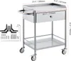 A stainless steel medical cart with a drawer and a lower shelf, shown with its dimensions and included accessories. Podgląd zdjęcia produktu