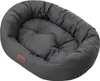 A dark gray, oval-shaped dog bed with a tufted cushion and a small brown tag with the word "DOGGY" on it. Voir les images du produit