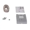 A collection of components for a garage door opener system, including a coiled cable, screws and wall plugs, a nut, an instruction manual, and the main control unit. Produktbild-Vorschau