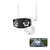 A dual-lens security camera with spotlights and antennas, shown with a smartphone displaying a live feed of a person and a car. Produktbild-Vorschau