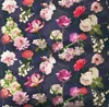 A collection of colorful flowers on a dark blue background. Produktbild-Vorschau
