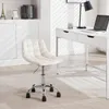 A cream white office chair with wheels is placed in front of a white desk in a well-lit room. Produktbild-Vorschau