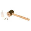 A wooden hammer, a small bottle of glue, and two wooden dowels are arranged on a white background. Produktbild-Vorschau
