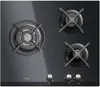A top-down view of a black gas stovetop with three burners and control knobs. Anteprima dell’immagine prodotto
