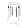 A white circular clothing rack with clothes hanging on it, set against a white background. Náhled obrázku produktu