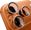 Close-up view of the camera lenses on the back of an orange smartphone. Náhľad obrázku produktu