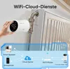 A hand is shown adjusting a smart thermostat on a radiator, with a diagram illustrating its connection to a smart speaker, smartphone, cloud server, Wi-Fi router, and another thermostat. Produktbild-Vorschau
