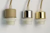 Three different colored light bulb sockets with attached wires against a white background. Produktbild-Vorschau