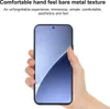 A hand holding a smartphone with a blue screen. Produktbild-Vorschau