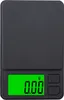 A digital scale with a green LED display. Náhľad obrázku produktu