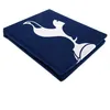 A folded navy blue duvet cover with the white Tottenham Hotspur FC crest printed on it, set against a white background. Náhled obrázku produktu