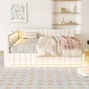 A bedroom scene featuring a white upholstered daybed with bedding and a pink throw blanket. Náhled obrázku produktu