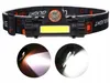 A black LED headlamp with an adjustable strap is shown against a white background. Two circular insets display the light beams from the headlamp. Anteprima dell’immagine prodotto