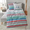 A bed with nautical-themed bedding and pillows, with decorative oars in the background. Produktbild-Vorschau