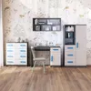 A child's bedroom set with a desk, dresser, and cabinet against a whimsical wallpaper. Náhled obrázku produktu