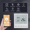 A hand holding a smartphone displaying a thermostat app next to a smart thermostat device. Náhled obrázku produktu
