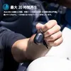 A person is holding a black earbud. Anteprima dell’immagine prodotto
