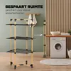 A collapsible drying rack is shown in a laundry room setting next to a washing machine. Voir les images du produit