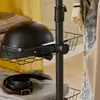 Nahaufnahme des SoBuy Garderobenständers KLS04-SCH mit Helm in einem Drahtkorb Produktbild-Vorschau