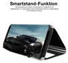 A smartphone case is shown in a stand-up position, displaying a black sports car on its screen. Produktbild-Vorschau