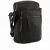 A black leather crossbody bag is shown against a white background. Anteprima dell’immagine prodotto