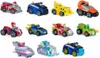 A collage of various toy vehicles, likely from the Paw Patrol franchise, arranged in rows against a white background. Produktbild-Vorschau