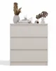 A chest of drawers with decorative items on top. Podgląd zdjęcia produktu