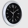 A wall clock on a textured wall. Anteprima dell’immagine prodotto