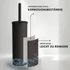 A diagram illustrating the features of a black toilet brush set, with text highlighting its high-quality steel construction and easy-to-clean surface. Anteprima dell’immagine prodotto