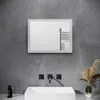 A modern bathroom setting with a mirror, sink, and faucet. Náhled obrázku produktu
