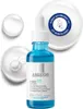 A bottle of La Roche-Posay Hyalu B5 serum is shown with two drops of serum on a white background. Produktbild-Vorschau