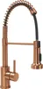 A copper kitchen faucet with a pull-down sprayer is shown against a white background. Anteprima dell’immagine prodotto