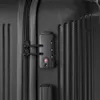 A close-up view of a black suitcase with a TSA-approved combination lock. Produktbild-Vorschau