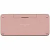 The back of a rose-colored keyboard is shown against a white background. Produktbild-Vorschau