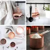 A collage of four images showing copper measuring cups and spoons filled with various ingredients, as well as hanging on a rack. Produktbild-Vorschau