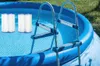 Two pool filter cartridges are shown inside an inflatable pool next to a ladder. Produktbild-Vorschau