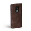 A brown flip cover case for a smartphone is shown against a white background. Produktbild-Vorschau