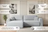 A light blue sectional sofa is shown in a well-lit room with decorative elements and feature callouts. Produktbild-Vorschau