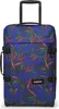 A blue suitcase with a tropical leaf pattern and black accents.