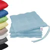 A stack of light blue seat cushions on a white background, with a stack of cushions in various colors on the left. Produktbild-Vorschau