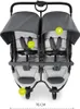 A top-down view of a double stroller. Produktbild-Vorschau