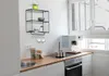 A kitchen scene with a wall shelf, coffee machine, and stove. Produktbild-Vorschau