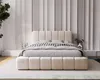 A modern bedroom with a beige upholstered bed. Náhled obrázku produktu
