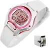 A white Casio digital watch with pink accents and a pink bezel, displayed on a white background. A small box containing a watch is also visible in the lower right corner. Produktbild-Vorschau