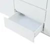 A close-up view of an open white drawer on a white cabinet. Produktbild-Vorschau