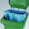 A blue trash bag is fitted inside a green trash can with the lid open. Náhled obrázku produktu